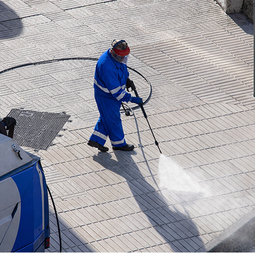 Professional concrete cleaning service removing stains and buildup